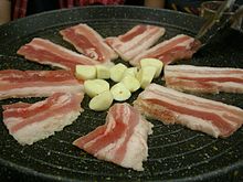 http://upload.wikimedia.org/wikipedia/commons/thumb/9/99/korean_barbeque-samgyeopsal-06.jpg/220px-korean_barbeque-samgyeopsal-06.jpg